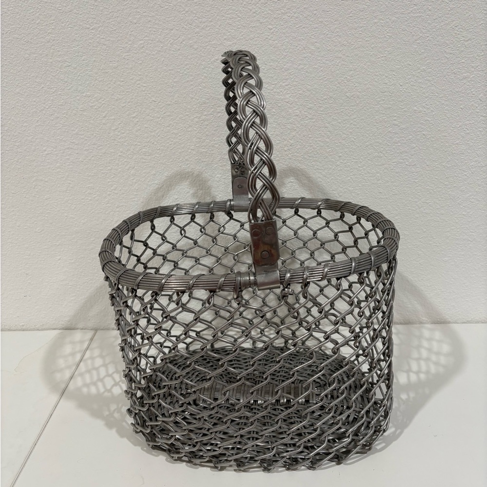 Silver Wire Basket with a woven handle 8 1/2” tall